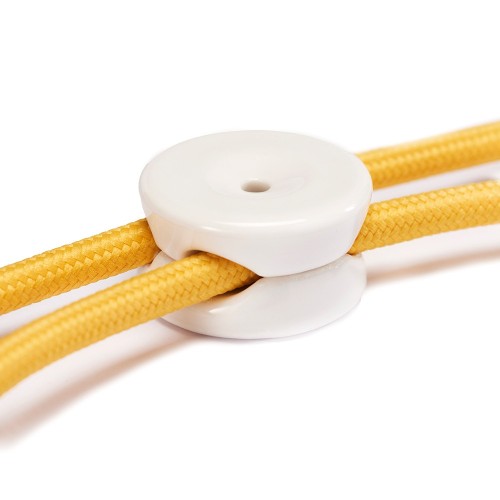 Fissaggio fermacavo in porcellana  bianca da parete